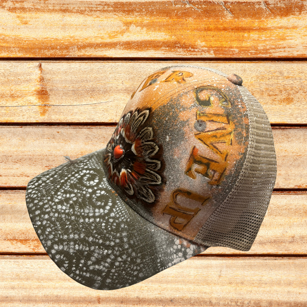 Green And Beige Trucker at with "Never Give Up" saying w feathers