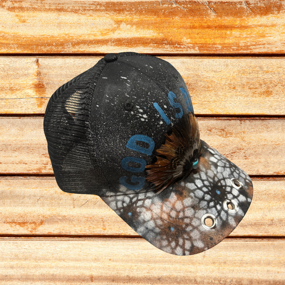 Black Hat with Feather and "God Is Dope" saying and Spray Painted flowers on bill