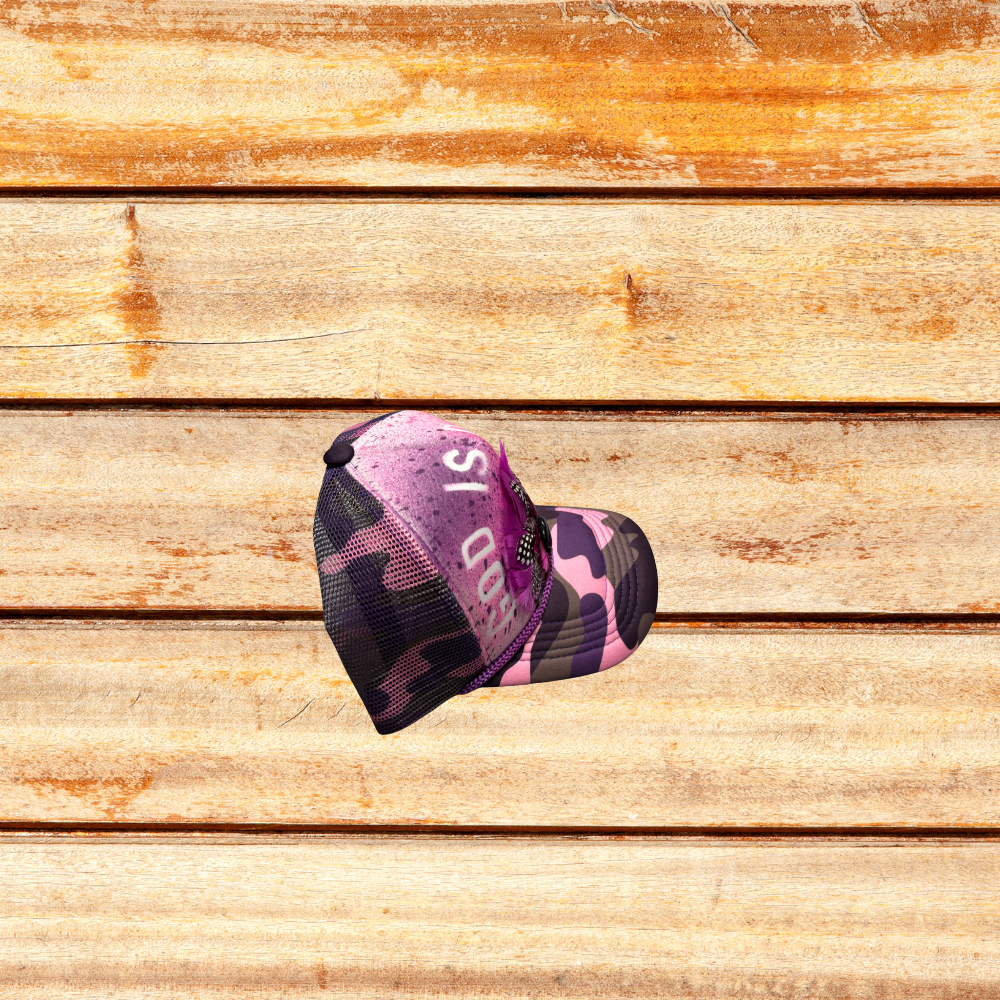Pink and Purple Camoflouge Trucker Hat with Feathers and "God Is Dope" saying